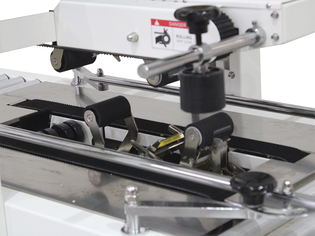 Seladora SXJ-6050 — detalhe das esteiras superiores e inferiores