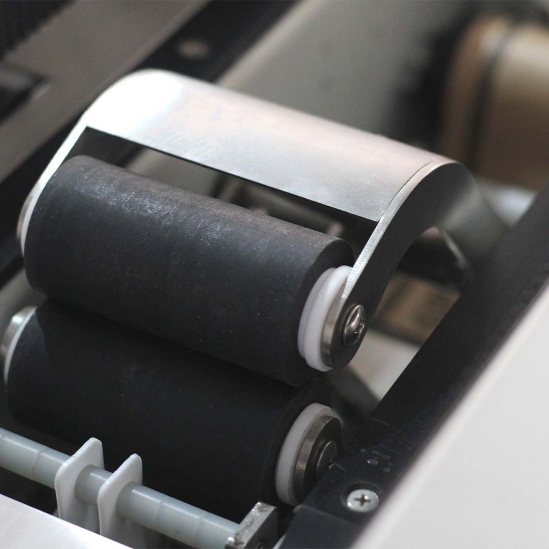 Seladora Eco Kraft 9001 — detalhe dos roletes de tração